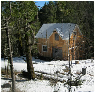Sometimes a beautiful building site can make just about any building look good. But, the steep roof of this Ashokan Barn, under construction in Georgetown, California seems just right for its mountainside location.  Stock plans are available for $35.00 from architect Don Berg.